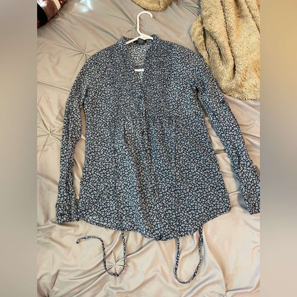 a dark blue floral adjustable blouse